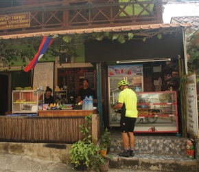 Michael buying breakfast at the bakery in Pak Beng