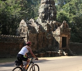 Carel passes gatehouse at Angkor complex