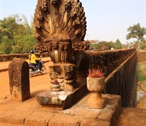 Guardian carving on Angkor Bridge