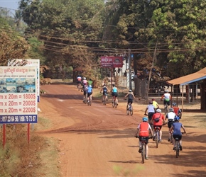 Group along red road