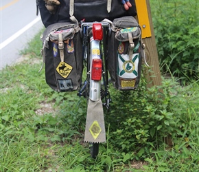 Colin's panniers are always a thing of beauty. He worked for the YHA and repairs much himself, the badges are tours we have been on