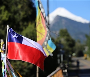 Chilean flag and Villarica Volcano
