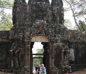 Carel and Malc exits entrance gate in Angkor Wat Complex