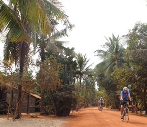 Chris Colyer on red road Banteay Samre