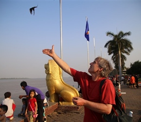 Neil releasing birds on the Riverside Walk Phnom Penh