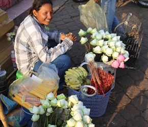 Bird seller on Riverside Walk Phnom Penh