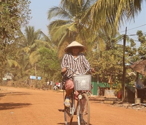 Local hat on red road to Sihanoukville