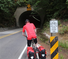 These are a great idea. Hit the button and a light flashes at the tunnel entrance lasting  for an estimated period that a cyclist will pass through the tunnel.