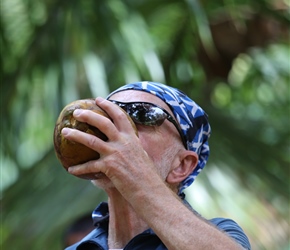 Bruce drinking coconut
