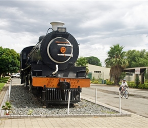 The 4-8-2 locomotive plinthed next to the main street in Ashton, Western Cape, is a SAR Class 14CRB engine n0 2010, built in 1919, as works no 60565 by the Montreal Locomotive Works division of the American Locomotive Co ("ALCO").