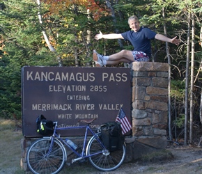 Neil atop the Kancamangus highway sign