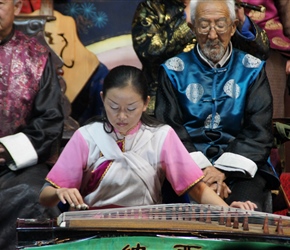 String player at Naxi Concert