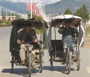 Rickshaw riders on the edge of Xiangyun