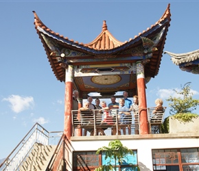Group in pagoda at resort