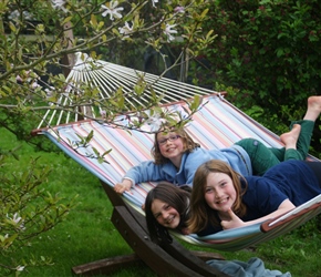 Kate, Jacqueline and Katie on the hammock at Brook Cottages Coleford