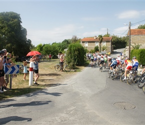 and as the peloton passes by...
