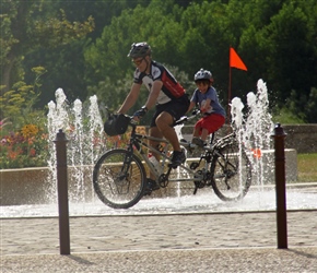 Gary and Harrison through the fountains in Pons