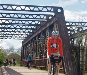 David crosses the old railway bridge on the Stratford Cycleway