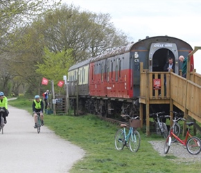 Penny and Siobhan pass the railway carriage tearoom on the Greenway