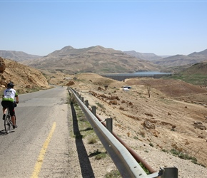 Sue heads towards the dam at the bottom of Wadi Mujib