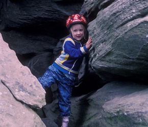 Louise climbing Brimham Rocks