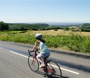 Louise cycles parallel to the Severn Valley