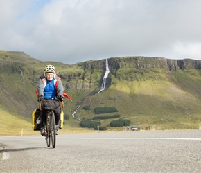 Mike starts the climb towards Snæfellsjökull National Park with Bjarnarfoss behind