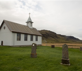 To the right was Breiðabólsstaðarkirkja Church. Unfortunately locked it had a smallgraveyard with family photos