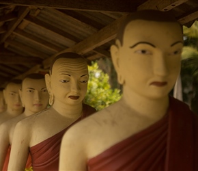 We spotted this line of figures from the road. seemingly tens of life-sized figured in a row leading to an enormous Buddha at Muruthawela temple