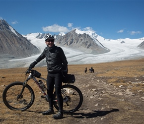 Steve in front of Khüiten Peak and glacier