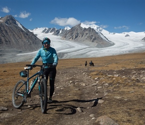 Lorna in front of Khüiten Peak and glacier