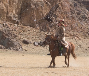 Eagle hunter on horseback