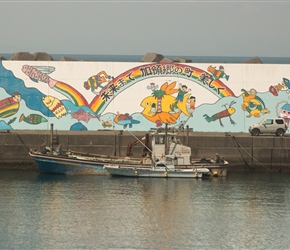 Fishing boat and mural